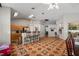 Open living area leads to a kitchen with bar seating, offering lots of room for entertaining at 4428 Winding River Drive, Valrico, FL 33596