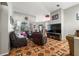 Spacious living room featuring tile flooring, high ceilings, comfortable seating and natural light at 4428 Winding River Drive, Valrico, FL 33596