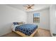 Bright bedroom with a ceiling fan and a window bringing in natural light at 4502 Banyan Tree Pl, Riverview, FL 33578