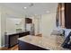 Well-equipped kitchen featuring stainless steel appliances, granite countertops, and ample cabinet space at 4502 Banyan Tree Pl, Riverview, FL 33578