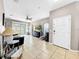 Inviting living room featuring tiled floors, a ceiling fan, and lots of natural light at 1718 Trailwater St, Ruskin, FL 33570