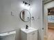Updated bathroom with modern vanity and fixtures at 4202 W Bay Vista Ave, Tampa, FL 33611