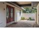 Paved walkway with plants leading to the front entrance at 4401 W Sam Allen Rd, Plant City, FL 33565