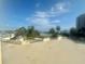 Breathtaking water view from the terrace that overlooks lush landscaping and community amenities at 6009 Sea Ranch Dr # 203, Hudson, FL 34667