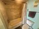 Clean and functional bathroom with a tiled shower and essential fixtures at 6009 Sea Ranch Dr # 203, Hudson, FL 34667