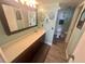 Well-lit bathroom with modern vanity and fixtures, offering functionality and style at 6009 Sea Ranch Dr # 203, Hudson, FL 34667