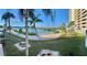 Enjoy the serene beach and bay views from this property, complete with palm trees and picnic areas for relaxing outdoors at 6009 Sea Ranch Dr # 203, Hudson, FL 34667