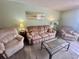 Cozy living room with comfortable seating, stylish decor, and plenty of natural light at 6009 Sea Ranch Dr # 203, Hudson, FL 34667