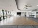 Large meeting room with wood dance floor, ample lighting and views from many windows at 6009 Sea Ranch Dr # 203, Hudson, FL 34667