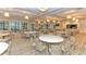 Large dining area with tables and chairs for community gatherings at 17109 Kenton Ter, Bradenton, FL 34202