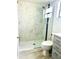 Bathroom boasts a sleek, glass-enclosed shower with contemporary fixtures and vanity at 12215 Cobble Stone Dr, Hudson, FL 34667