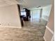 Modern kitchen featuring stainless steel appliances, a center island with bar seating, and tiled floors at 12215 Cobble Stone Dr, Hudson, FL 34667