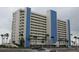 A high-rise building with blue and white accents at 15000 Gulf Blvd # 1104, Madeira Beach, FL 33708