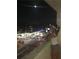 Night view from balcony overlooking city lights at 15000 Gulf Blvd # 1104, Madeira Beach, FL 33708