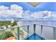 Stunning balcony overlooking the water, cityscape, and tree-lined road at 2900 Bay To Bay Blvd # 1502, Tampa, FL 33629