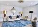 Elegant lobby with stylish seating, unique patterned rug, and a chic gold lamp at 2900 Bay To Bay Blvd # 1502, Tampa, FL 33629