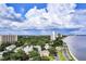 Aerial view of a beautiful waterfront community with lush green spaces at 2900 Bay To Bay Blvd # 1502, Tampa, FL 33629