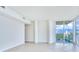 Modern living room with access to a private balcony and city views at 2900 Bay To Bay Blvd # 1502, Tampa, FL 33629