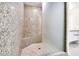 Spa-like shower with granite walls and bench at 2900 Bay To Bay Blvd # 1502, Tampa, FL 33629
