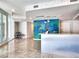 Modern lobby with a large mural, stylish seating, and a contemporary reception desk at 2900 Bay To Bay Blvd # 1502, Tampa, FL 33629