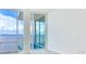 Bright living room with floor-to-ceiling windows and water views at 2900 Bay To Bay Blvd # 1502, Tampa, FL 33629