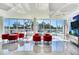 Relaxing common area with red chairs and pool view at 2900 Bay To Bay Blvd # 1502, Tampa, FL 33629