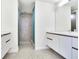 Modern bathroom with double vanity, granite flooring, and a walk-in shower at 2900 Bay To Bay Blvd # 1502, Tampa, FL 33629
