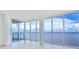 Spacious living area featuring floor-to-ceiling windows and water views at 2900 Bay To Bay Blvd # 1502, Tampa, FL 33629