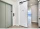 Building entrance with elevator and apartment number at 2900 Bay To Bay Blvd # 1502, Tampa, FL 33629