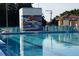 Community pool with mosaic art and ample deck space at 85 Davis Blvd # B, Tampa, FL 33606
