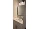 Simple bathroom with white vanity and marble shower at 2608 E Clark St # 2, Tampa, FL 33605