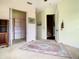 Spacious bedroom with large closet and access to a hallway at 935 Bayshore Dr, Palmetto, FL 34221