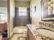 Clean bathroom with granite vanity and tile shower surround at 935 Bayshore Dr, Palmetto, FL 34221