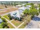 Aerial view of a house with metal roof in a residential area at 320 Ibisview Lane # 33572, Apollo Beach, FL 33572