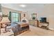 Spacious bedroom with large window and dresser at 320 Ibisview Lane # 33572, Apollo Beach, FL 33572