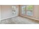 Spacious bedroom with neutral walls, carpeting, and large windows at 320 Ibisview Lane # 33572, Apollo Beach, FL 33572
