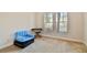 Bright bedroom with window and neutral decor at 320 Ibisview Lane # 33572, Apollo Beach, FL 33572