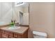 Clean bathroom with a vanity, toilet, and mirror at 320 Ibisview Lane # 33572, Apollo Beach, FL 33572