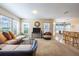 Open concept living room with views into kitchen at 320 Ibisview Lane # 33572, Apollo Beach, FL 33572