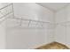 Spacious walk-in closet with wire shelving at 320 Ibisview Lane # 33572, Apollo Beach, FL 33572