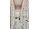 Hallway with neutral walls, carpeting, and doors to other rooms at 320 Ibisview Lane # 33572, Apollo Beach, FL 33572