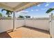 Brick paved patio with white fence and gate at 320 Ibisview Lane # 33572, Apollo Beach, FL 33572