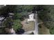 Aerial view showing a house and surrounding land at 3736 Lado Dr, Wesley Chapel, FL 33543