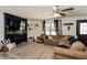 Living room with comfy seating and large TV at 3736 Lado Dr, Wesley Chapel, FL 33543