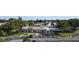 Aerial view of Tahitian Gardens community, showing homes, landscaping, and recreation center at 4329 Tahitian Gardens Cir # B, Holiday, FL 34691