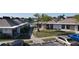 Charming condo exterior with beautiful landscaping and guest parking available at 4329 Tahitian Gardens Cir # B, Holiday, FL 34691