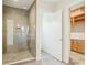 The bathroom features a glass shower, a toilet room, and a wardrobe at 1630 Douglas Ave, Dunedin, FL 34698