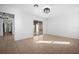 Bright dining room with access to the kitchen and patio at 2510 Sheila Ln, North Port, FL 34286