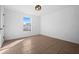 Bright bedroom with tile flooring and large window at 2510 Sheila Ln, North Port, FL 34286