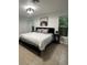 Spacious main bedroom with king-size bed and large windows at 2510 Sheila Ln, North Port, FL 34286